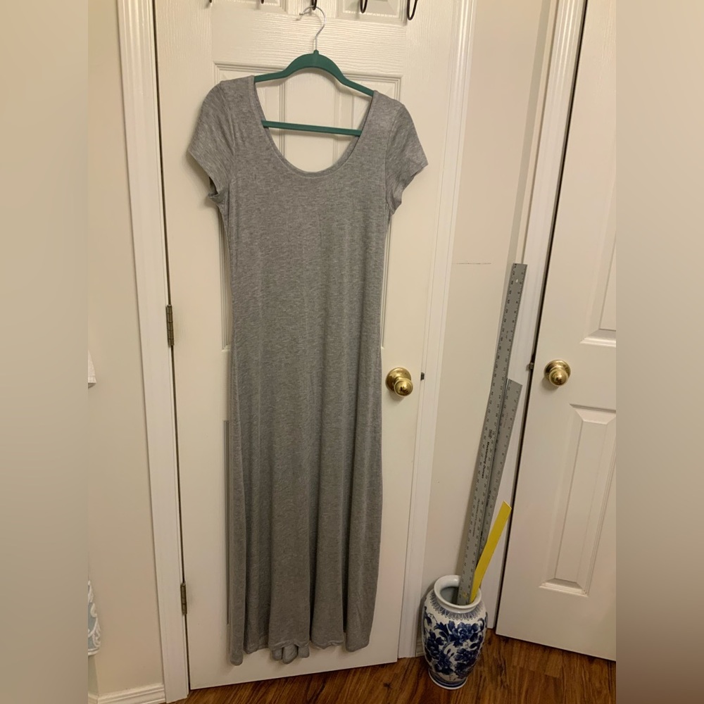 Junior’s size XL maxi dress. New without tags. Pit to pit 18 1/2.